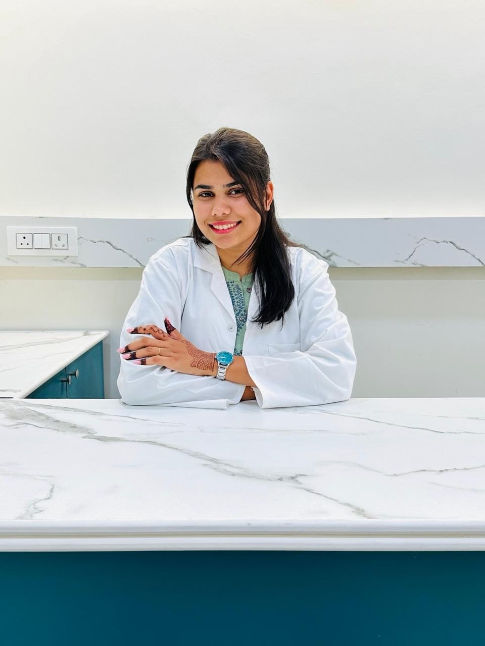 Mudraa Ramnani, RCI-certified speech therapist, at her consultation desk